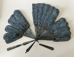 Restauration eventail en plumes